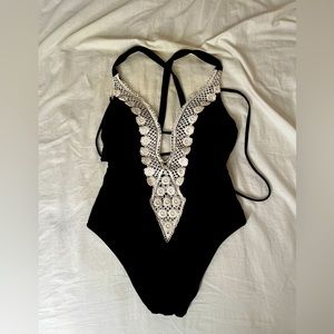 super comfy and flattering one price bathing suite with pad slots